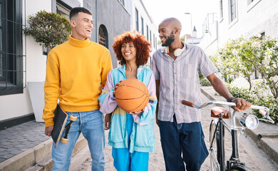 Canvas Print - People, city and friends walking outdoor with a basketball and bicycle for student travel and fun. Diversity, talking and group of men and woman laugh on funny adventure and freedom on urban street