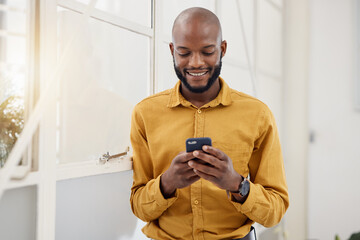 Poster - Business, happy black man and typing with phone in office for social network, mobile website and internet contact. Employee scroll on smartphone chat, reading news app and notification of information
