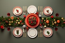 Christmas Table Setting With Dishware, Silverware And Decorations On Festive Table. Top View.