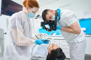 Wall Mural - Female patient at the reception in the dental office