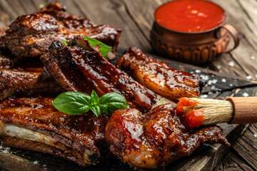 Wall Mural - barbecue ribs with sauce. Food recipe background. Close up