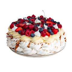 Wall Mural - Pavlova Berry Cake with salted caramel sauce, ffresh raspberries, strawberries, cherry and blueberry on neutral grey background