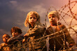 © the_lightwriter - refugees kids in front of barbed wire border