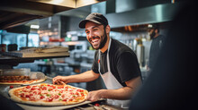 Male Chef Makes Pizza In A Restaurant.