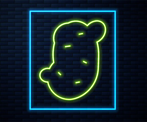 Poster - Glowing neon line Potato icon isolated on brick wall background. Vector