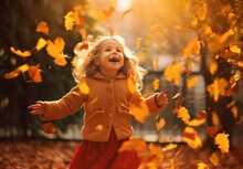 Autumn Child, Generative Ai Image Of Little Kid Happy To Play With Fall Leaves