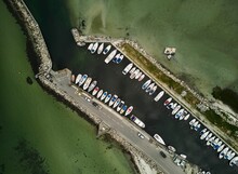 An Aerial Shot Of Boats Docked On The Harbor In Denmark
