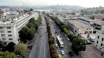 Sticker - Drone shot over The Aqueduct of Valens with traffic and cityscape in Istanbul, Turkey