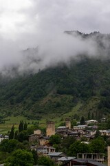 Canvas Print - Aerial view of a town in green mountains in Mestia, Georgia