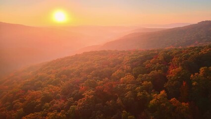 Wall Mural - Sunrise drone aerial over colorful foggy autumn Arkansas ozark mountains and fall forest trees