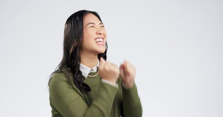 Wall Mural - Winner, fist pump and Asian woman on a white background with wow celebration, success and victory. Happy, surprise and isolated person excited for winning competition, bonus and giveaway in studio