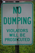 No Dumping Sign Violators Will Be Prosecuted
