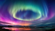 Sky Adorned, Vivid Aurora Rings Encircle, Above, A Mesmerizing Cosmic Ballet Enchants
