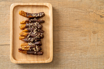 Wall Mural - banana chocolate coating or banana dipped chocolate