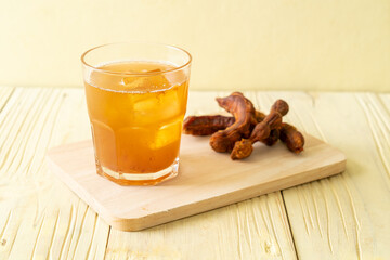 Poster - Delicious sweet drink tamarind juice and ice cube