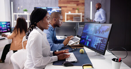 Poster - african financial data analysts using dashboard on screens