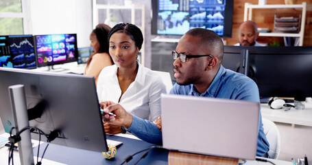 Poster - African Financial Data Analysts Using Dashboard On Screens