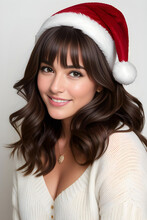 Portrait Of Beautiful Young Brunette Woman With Christmas Hat