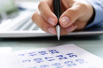 Wall Mural - Businesswoman Marking Date On Calendar