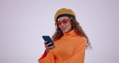 Aufkleber - Smile, phone and young woman in a studio browsing on the internet, mobile app or social media. Happy, laugh and female model watching funny videos online with a cellphone isolated by white background