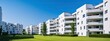 © Thares2020 - Modern white apartment with green grass landscape. Luxury condo design with background. Stylish and sky view