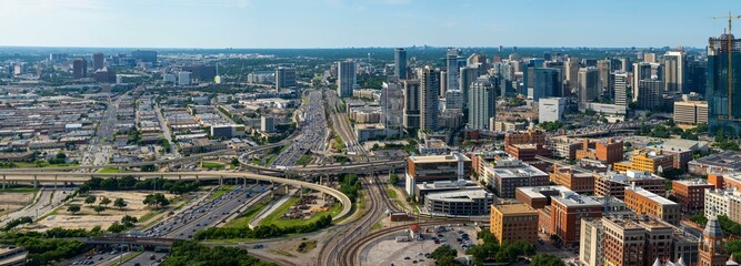 Wall Mural - Urban Motion: Aerial 4K Image of Dallas Texas Traffic Flow on Busy Roads