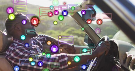 Poster - Animation of icons, speech bubbles, african american man holding steering wheel and sitting in car