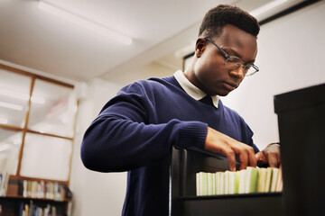 Aufkleber - School research, notes and a black man in a library for knowledge, learning or studying. University, scholarship and a young African person or student looking at books for decision or choice