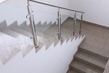 Stainless Steel Handrails On The Stairs In The Building
