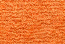 Orange Microfiber Cloth Texture Background. Textile Surface Texture. Soft Fabric Background.