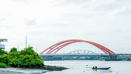 Wall Mural - Binh Loi Bridge passes Sai Gon river in Ho Chi Minh city,Viet Nam. June 2022