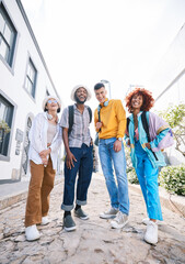 Canvas Print - Happiness, friends in city and people in portrait, gen z and fashion, memory with laughter and travel. Students smile, low angle and urban streetwear style, funny and friendship with trendy clothes