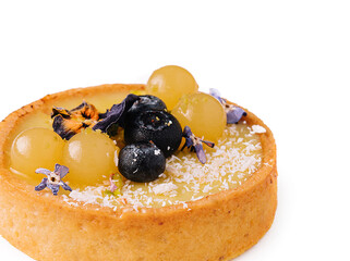 Wall Mural - Lemon tartlet with blueberries and grapes