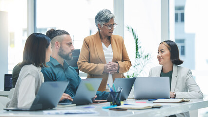 Poster - Business people, laptop and meeting, productivity and marketing strategy, creative group at digital agency and team. Man, women and diversity, working together and senior leader with branding ideas
