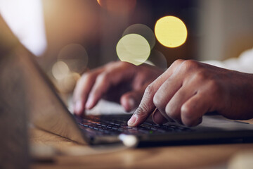 Laptop keyboard, hands and night person typing, copywriting or working late on social media content writing. Closeup, dark office and writer editing online article, information or creative essay