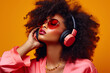 © Anna - Beautiful african american woman with afro hairstyle and headphones listening to music.