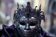 Purple and black gothic mask in venice during the carnival in san marco square