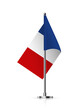 Flag of France on pole vector illustration. 3D realistic flagpole on mini steel vertical stand, isolated desktop flagstaff, blue, white and red french flag with stripes on metal stick