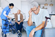 © Sharne/peopleimages.com - Healthcare, doctor and a man with a headache in a nursing home, depression or consultation. Talking, help and a nurse with elderly people for support with a migraine, retirement stress or sick