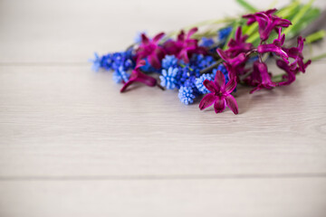 Sticker - beautiful bouquet of spring flowers on a wooden table