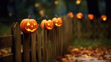 Halloween Pumpkin Lantern On The Fence 