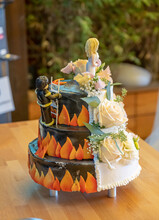 Two Side Firefighter Beautiful Delicious Wedding Cake In Many With Fresh Wild Flowers Save The Girl
