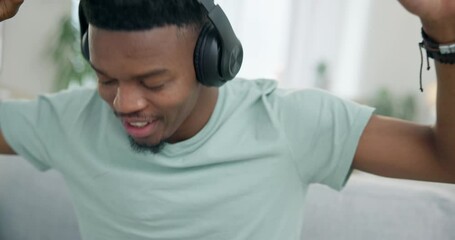 Poster - Black man, headphones and dance to music, audio streaming with stress relief and relax at home. Listening to radio, technology and subscription, energy and entertainment, lounge on couch with app