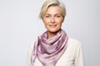 © Anne-Marie Albrecht - Medium shot portrait of a Russian woman in her 40s in a white background wearing a foulard