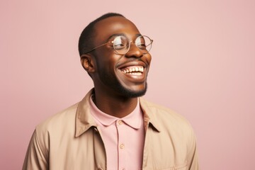 Wall Mural - Portrait of a happy african american man in eyeglasses