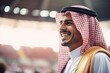 © Leon Waltz - Portrait of smiling arabian businessman standing in the football stadium