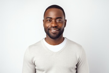 Wall Mural - Handsome african american man smiling and looking at camera