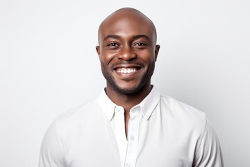 Wall Mural - Portrait of happy african american man looking at camera over white background