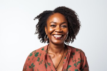 Wall Mural - Portrait of a smiling african american woman isolated on a white background