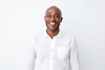 Wall Mural - Handsome african american man smiling and looking at camera over white background